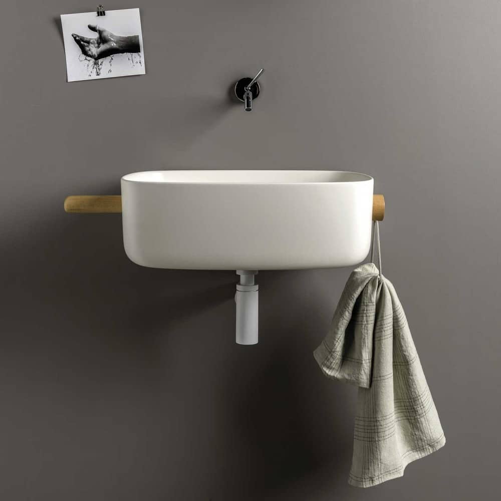 lavabo sospeso in cristalplant con portasciugamani