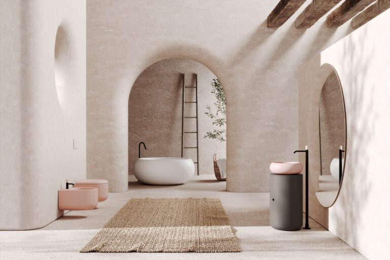 bagno toni neutri con sanitari e lavabo rosa, vasca bianca bombata